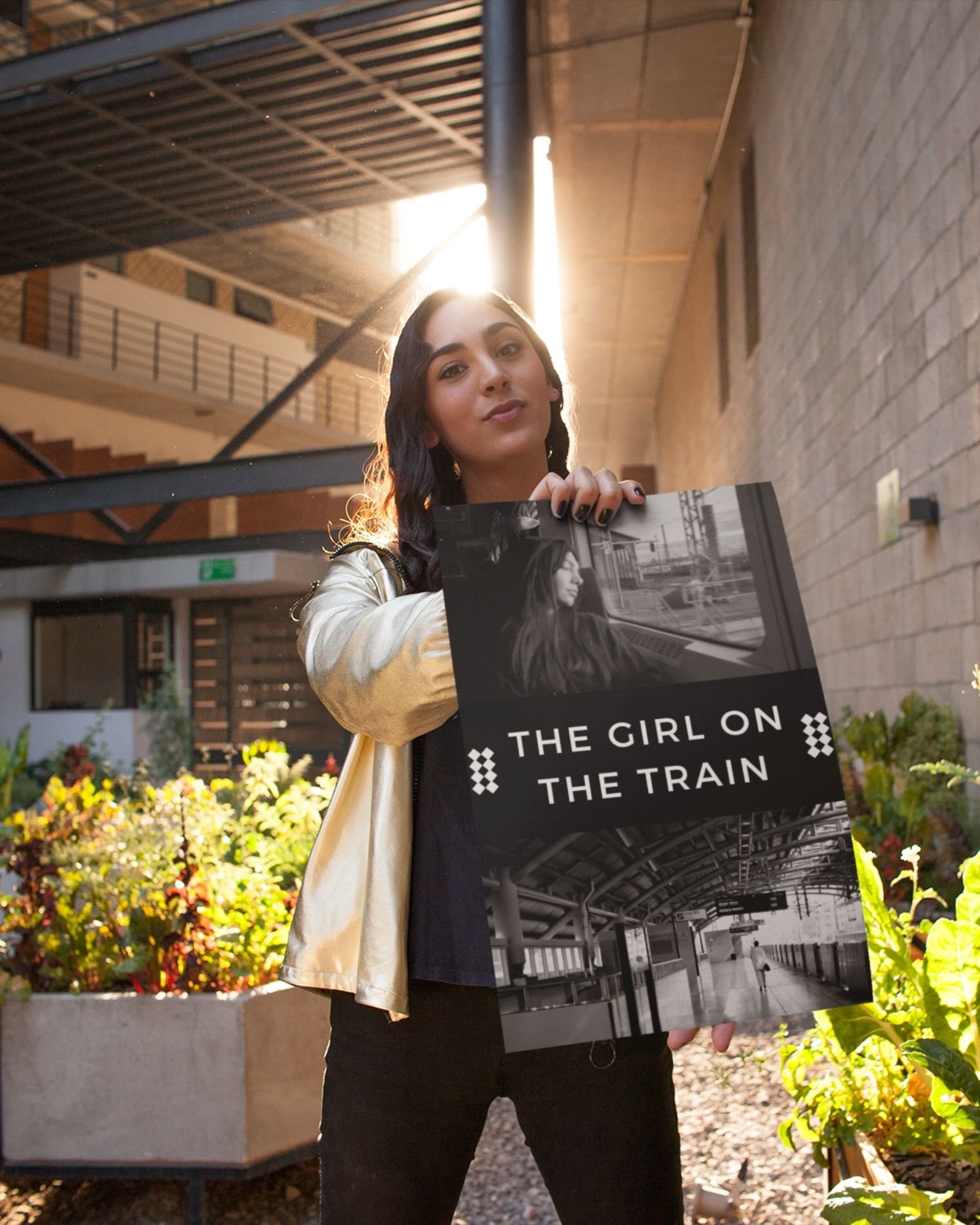 The-girl-on-the-train-paula-hawkins-person-holding-poster-courtyard-musings-of-a-reader